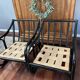 Set of two vintage black and white bamboo chairs.