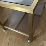 Coffee end table in smoked glass and brass