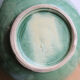 Large glazed ceramic salad bowl with a floral design.