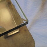 Console in brushed metal and 70s glass