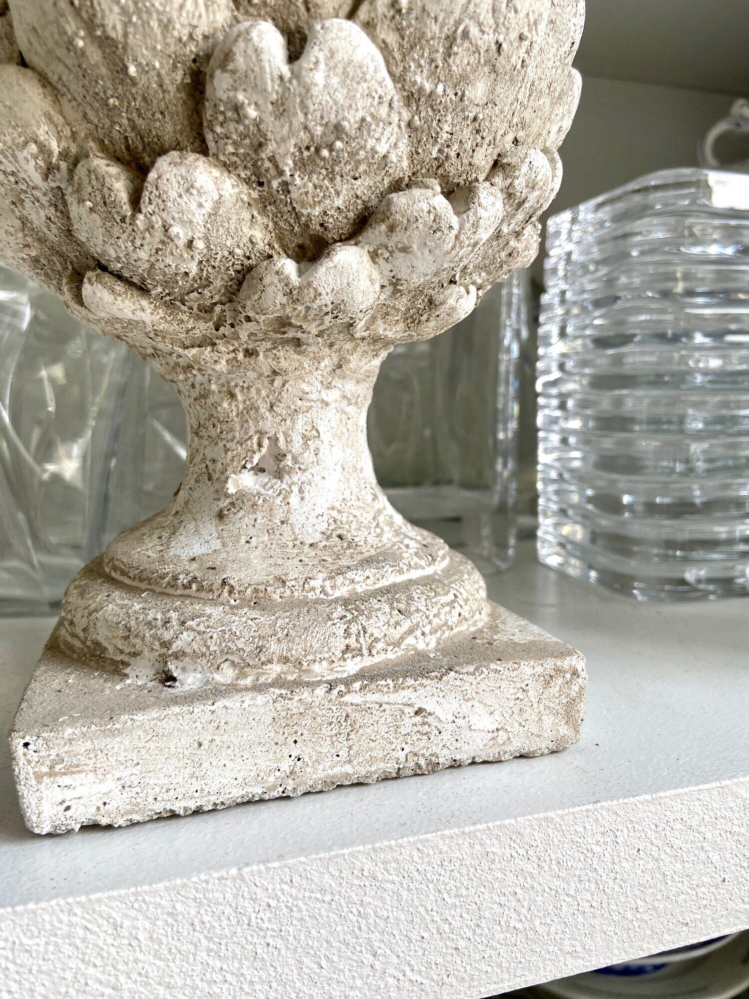 Ornamental artichokes in bleached concrete