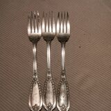 3 silver metal forks