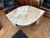 70s design marble coffee table in the shape of a droplet.