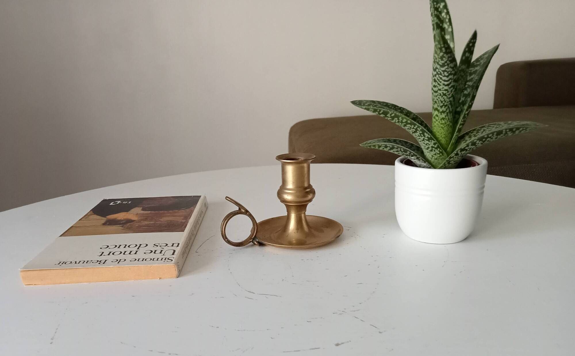 Antique hand candlestick in solid gilded brass.