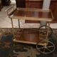 Servant table in gilded metal and mahogany mid-twentieth century