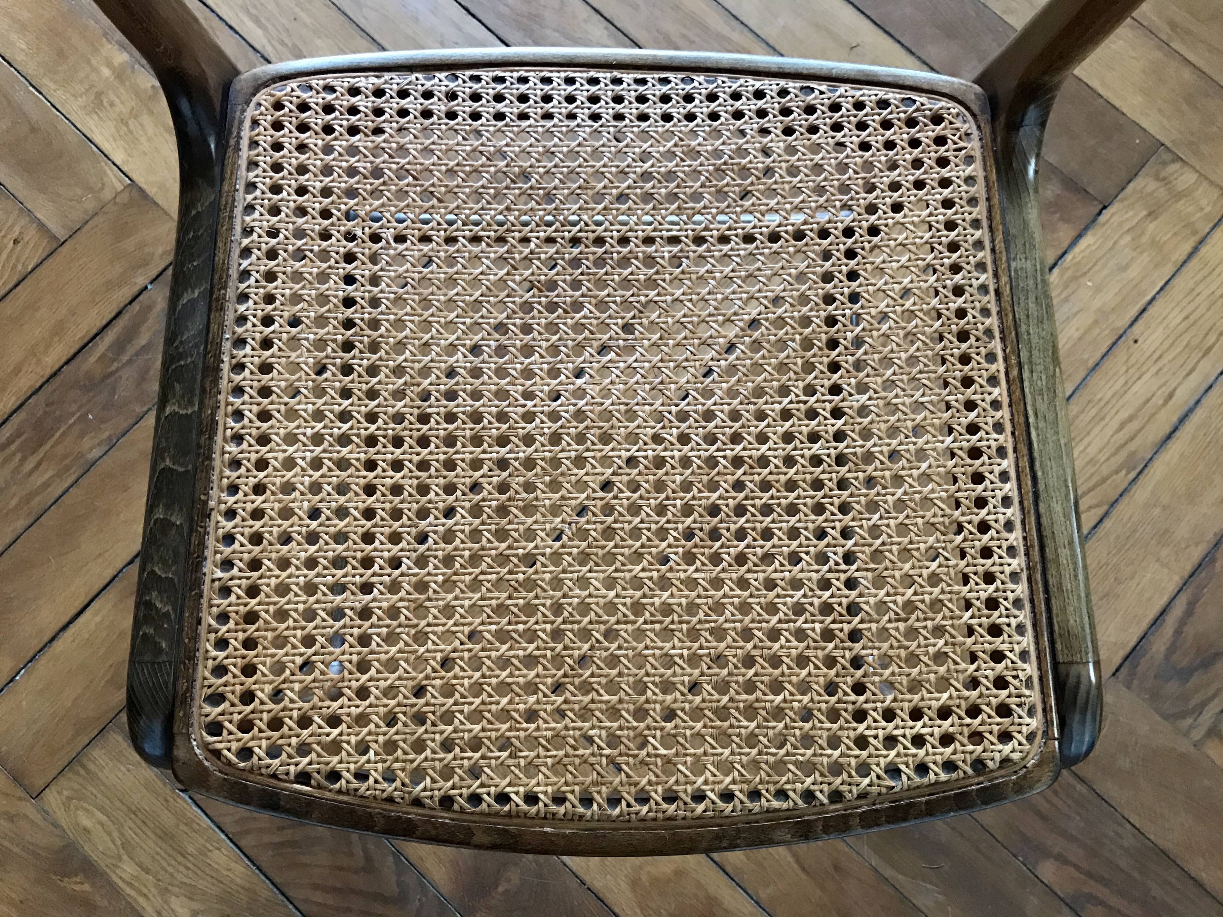 Series of 4 sleigh chairs in wicker, by Baumann