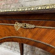 Antique French-style desk with green leather top and bronze mounts