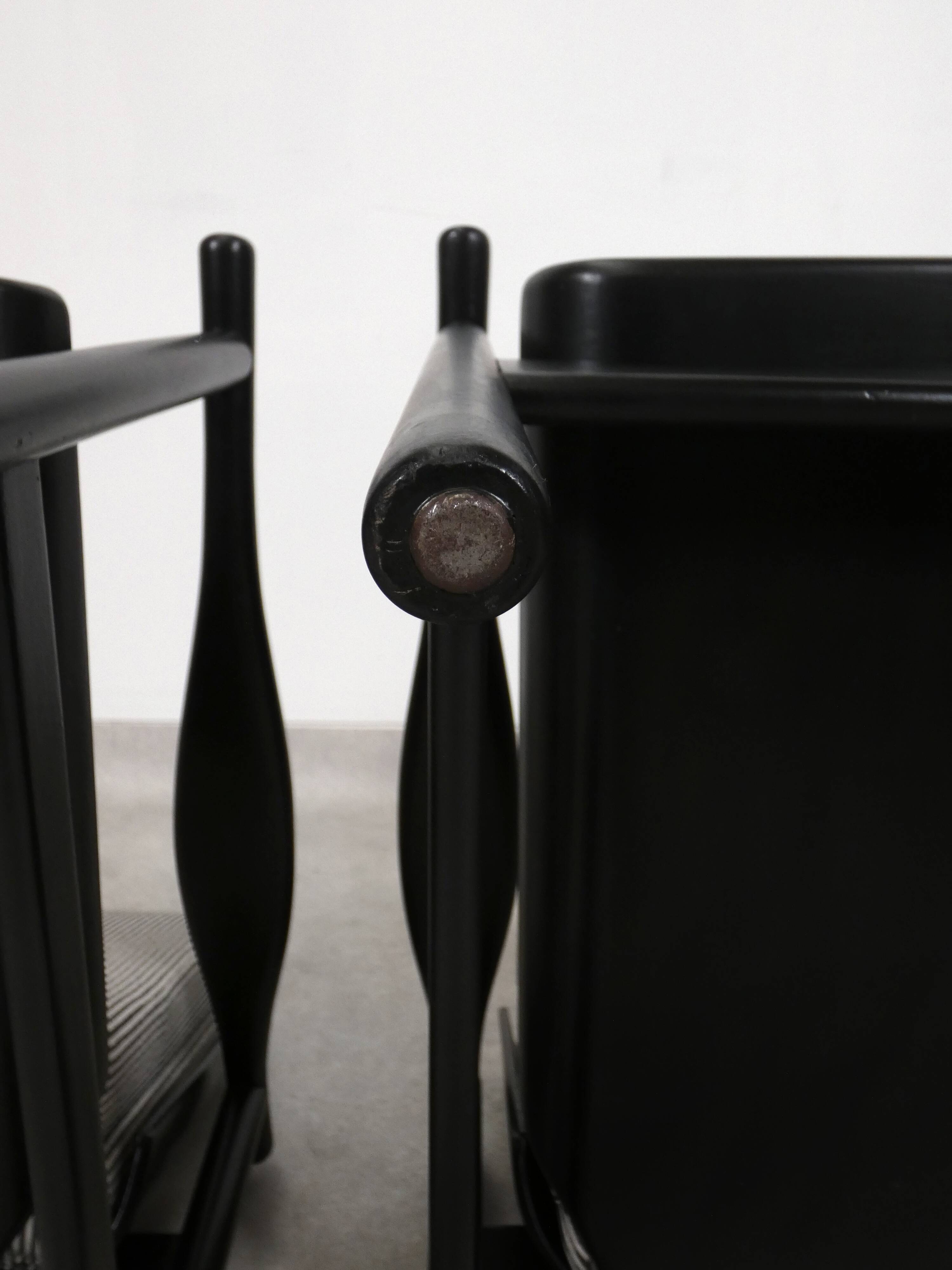 2x wooden Scandinavian arm chairs