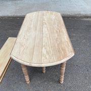 Renovated Louis Philippe round extendable dining table with flaps and 3 extensions.