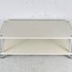 Table basse en acier laqué "crème", double plateaux, France, circa 1970