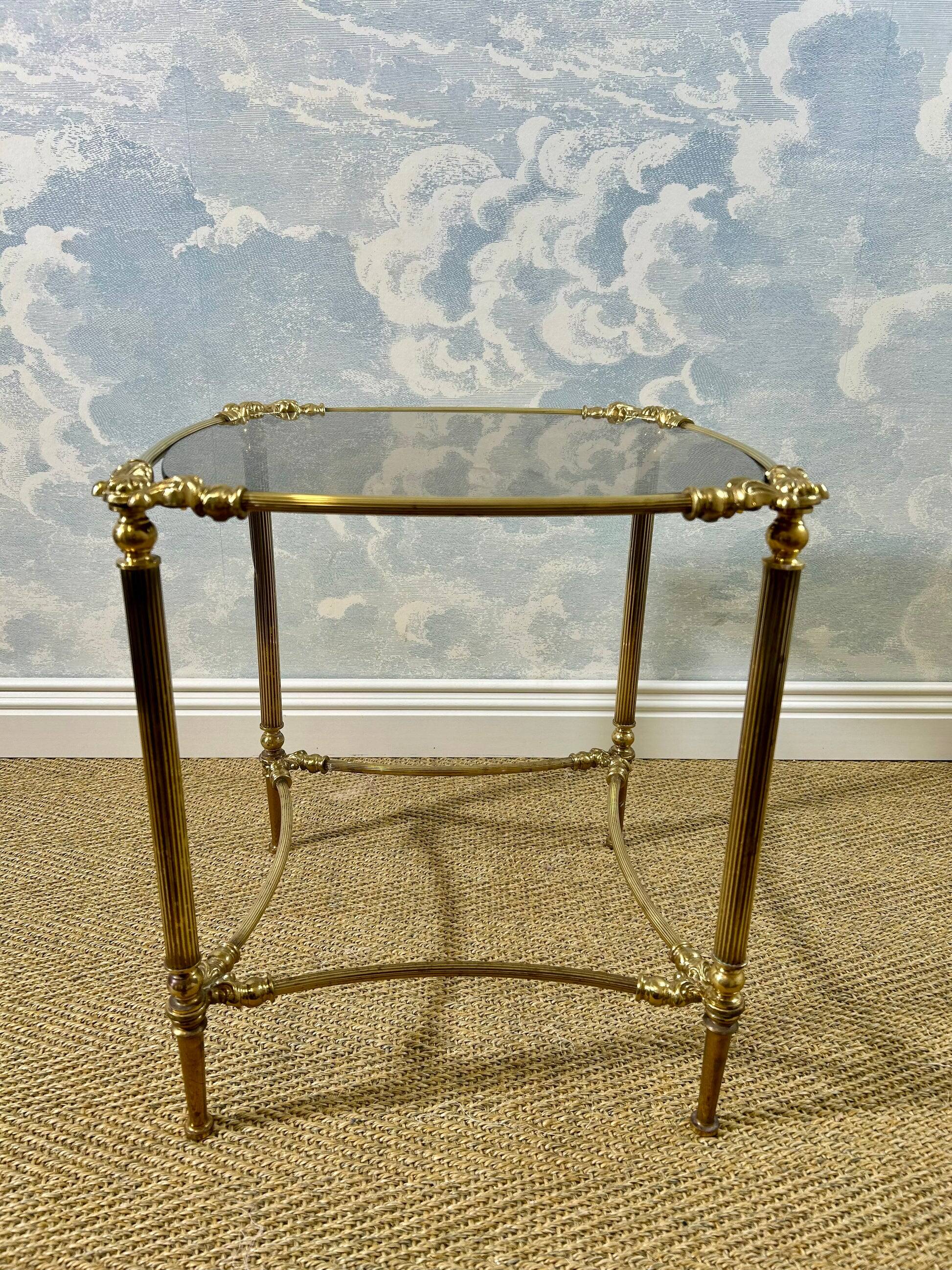 Small side table with a smoked glass top, Hollywood Regency.