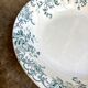Plat rond creux St Amand & Hamage en terre de fer, service "Campanule"