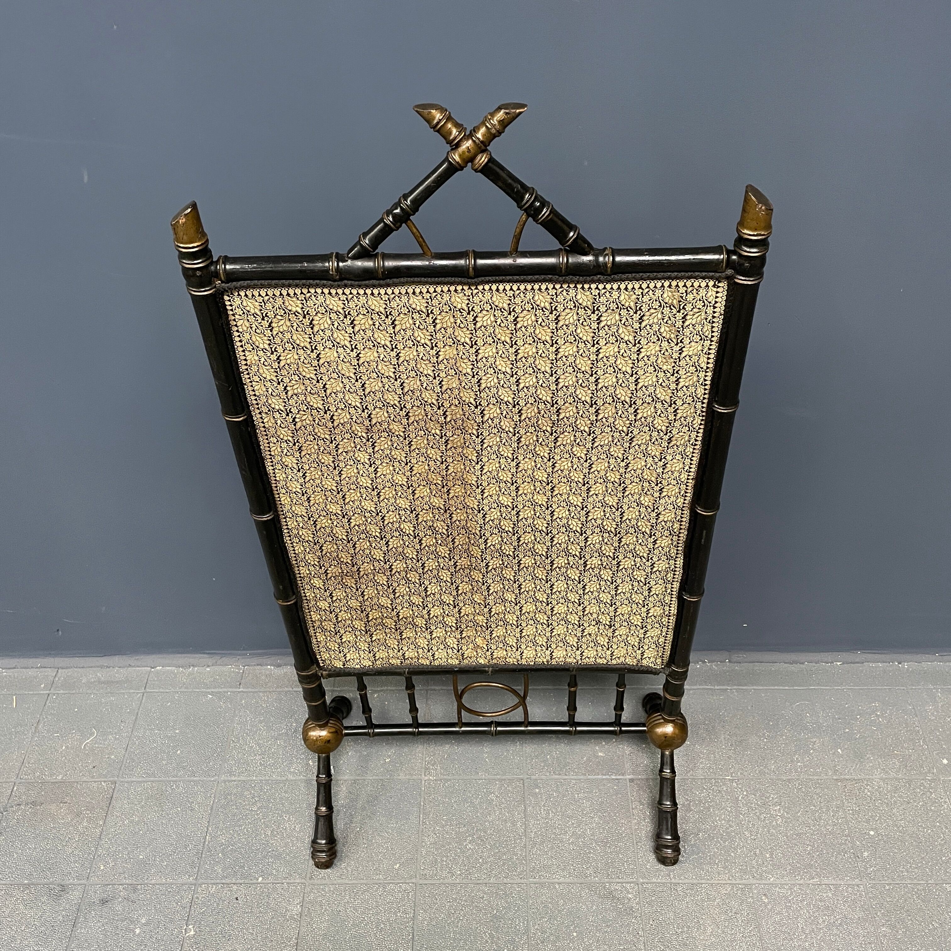 Antique black and gold faux bamboo fireplace screen