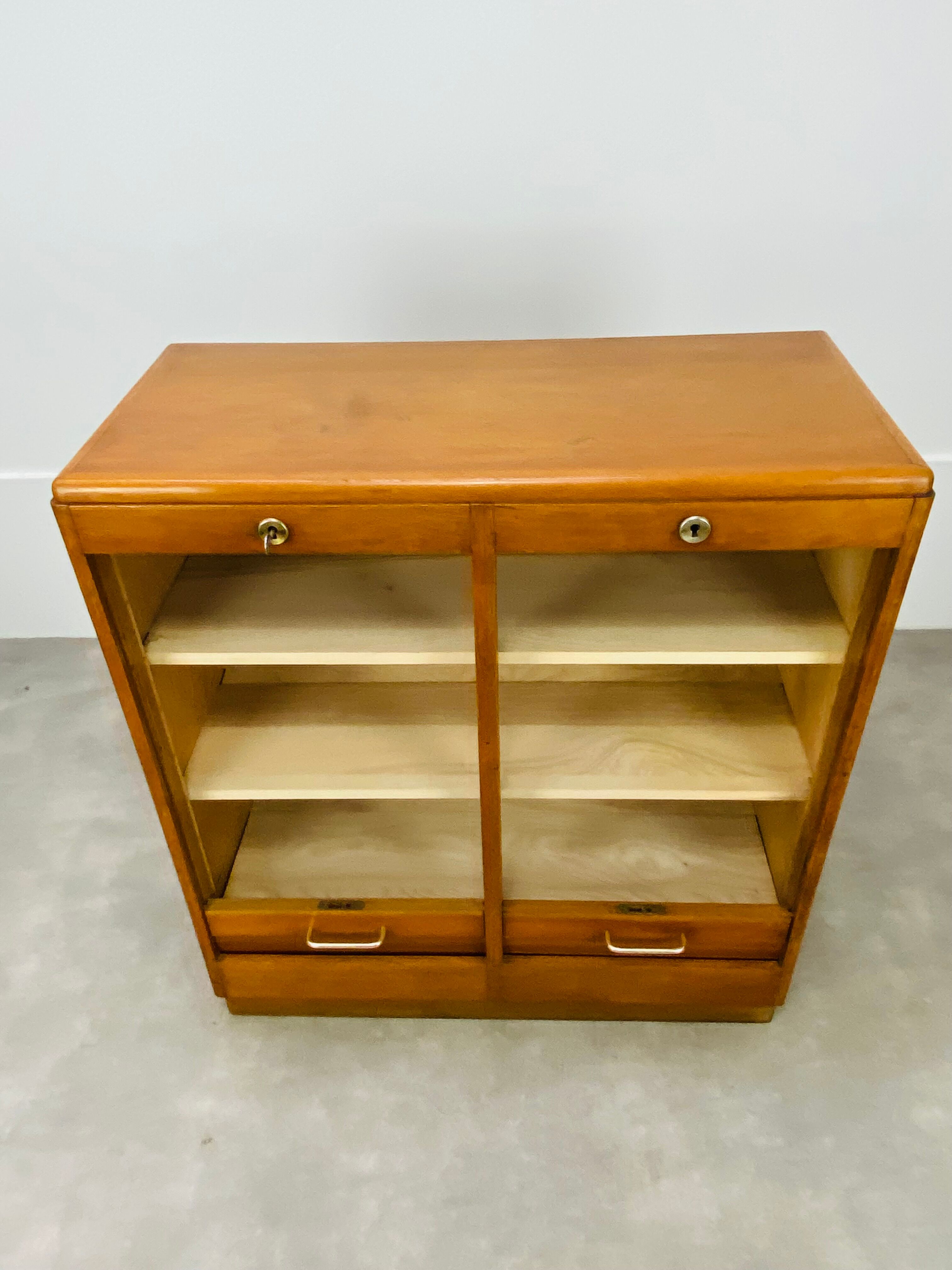 Double curtain binder cabinet