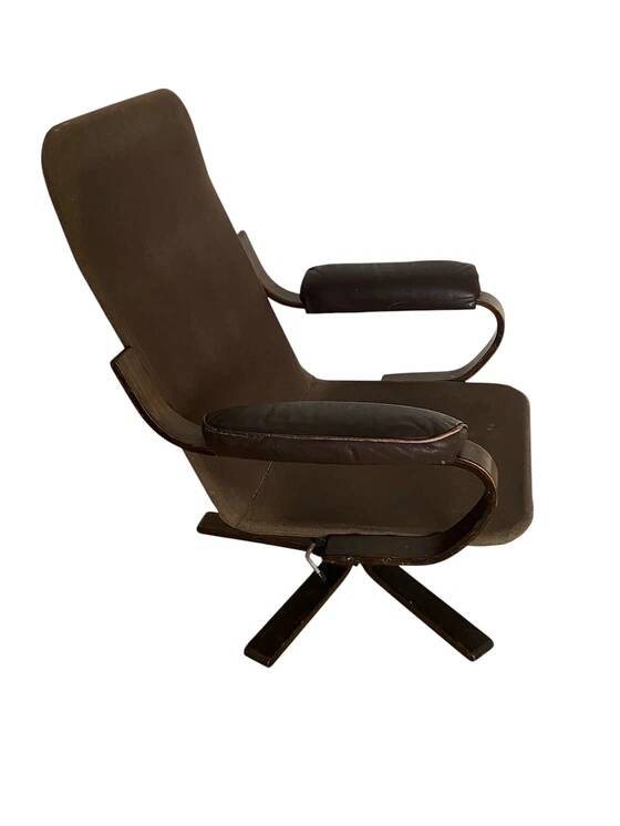 Vintage Scandinavian armchair in curved wood and leather