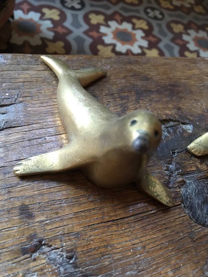 Couple of sea lions brass.
