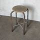 Old vintage metal and wood industrial workshop stool