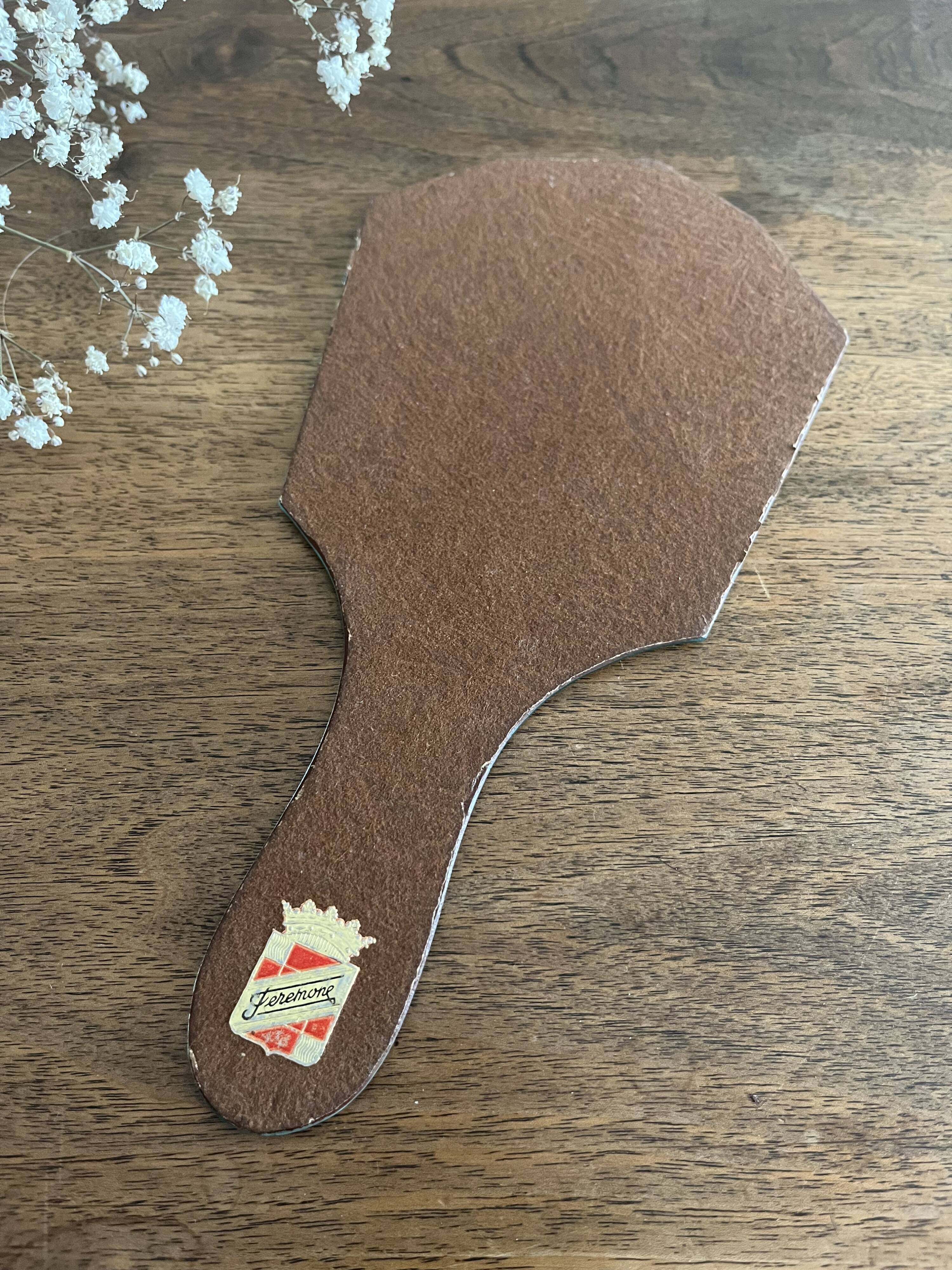 Beveled hand mirror