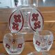 Vintage liqueur service in decorated red glass – decanter and 7 glasses