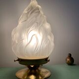 Old laying flame lamp