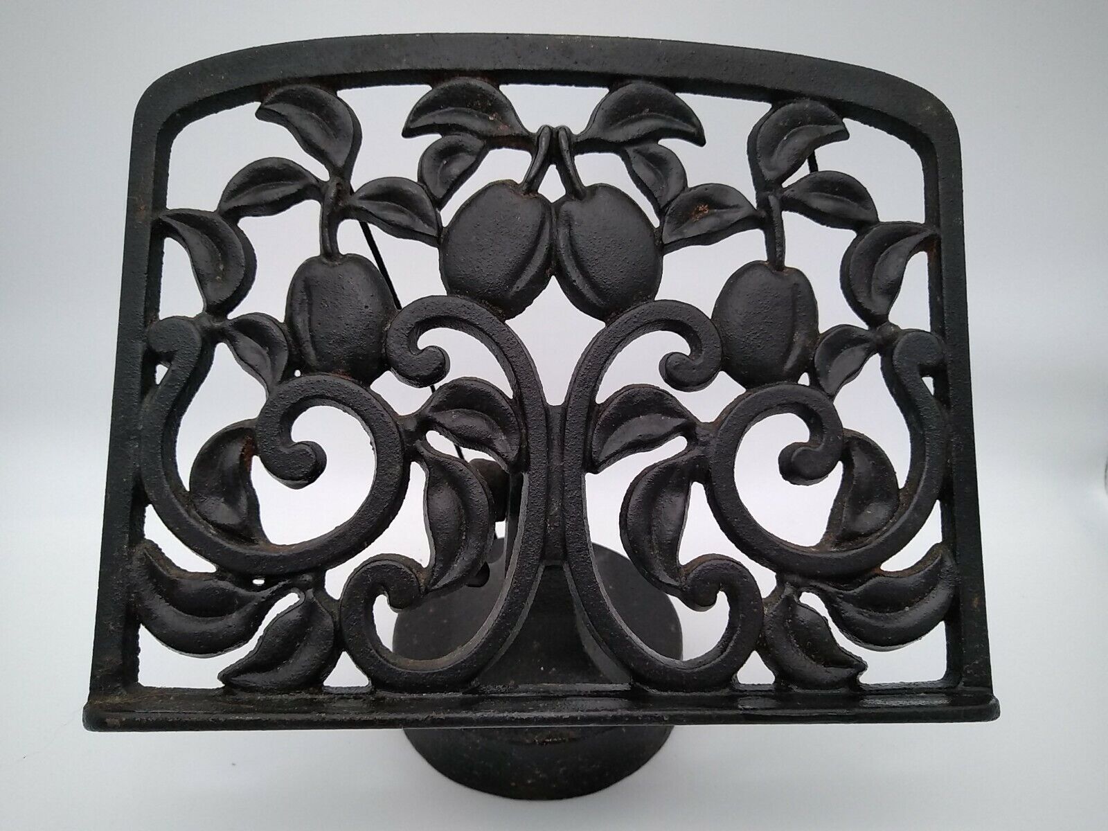 Cast iron lectern or lectrin with fruit decoration.