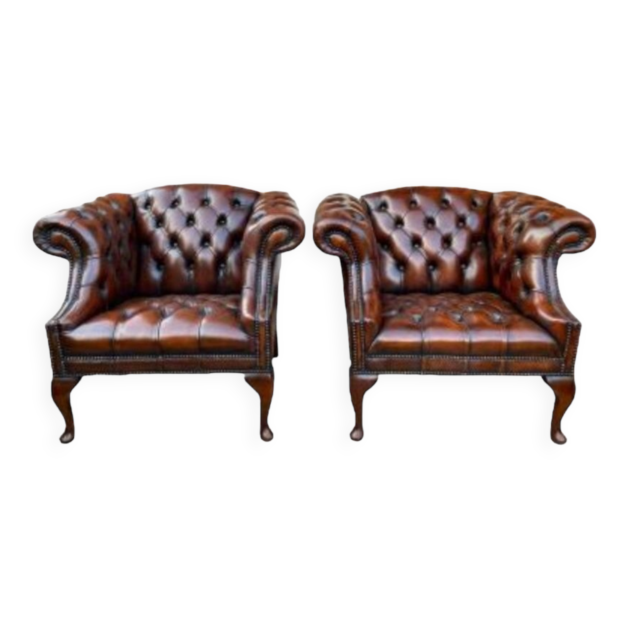 Pair of leather Chesterfield armchairs