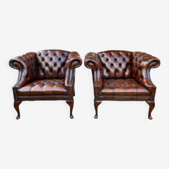 Paire de fauteuils Chesterfield en cuir