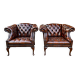 Pair of leather Chesterfield armchairs
