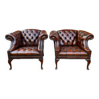 Pair of leather Chesterfield armchairs