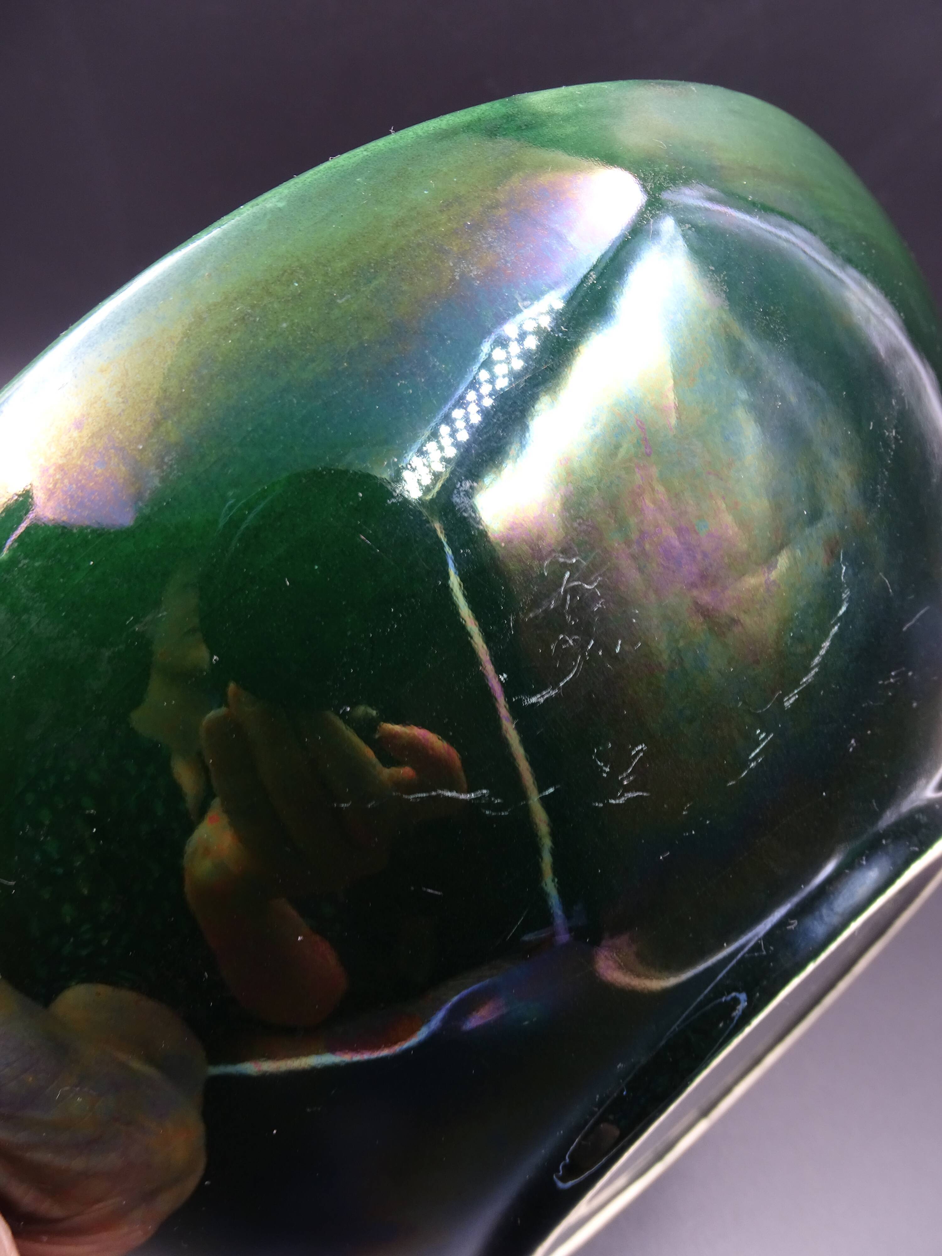 Green faience bowl decorated with multicolored drips around 1970