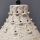 Two ceramic hanging lamps, in creamy white color, looking almost like coral