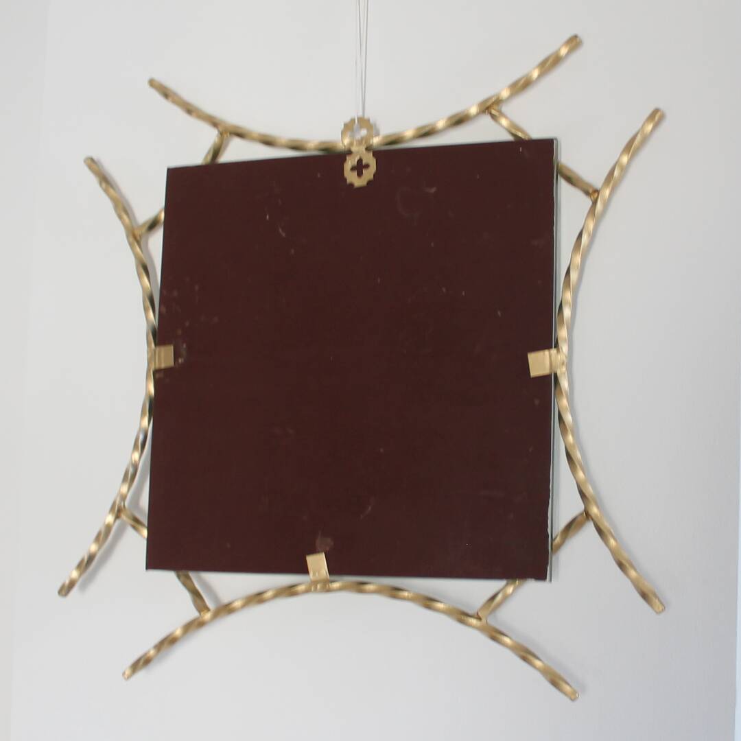 Miroir en fer forgé doré