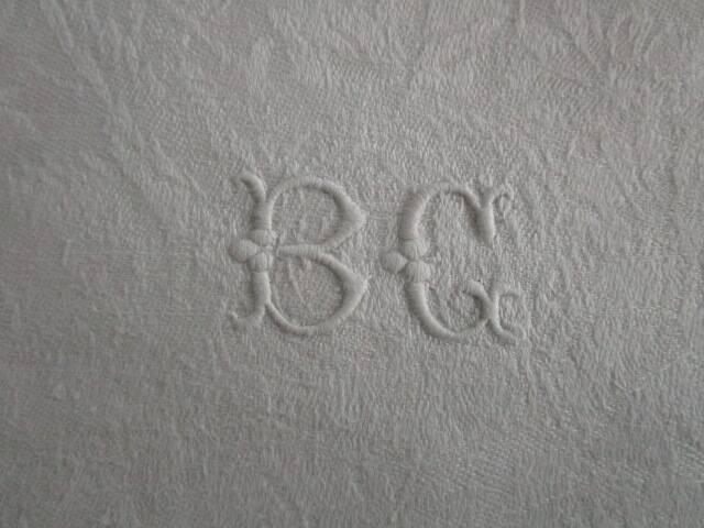 12 large old damask napkins, monogrammed