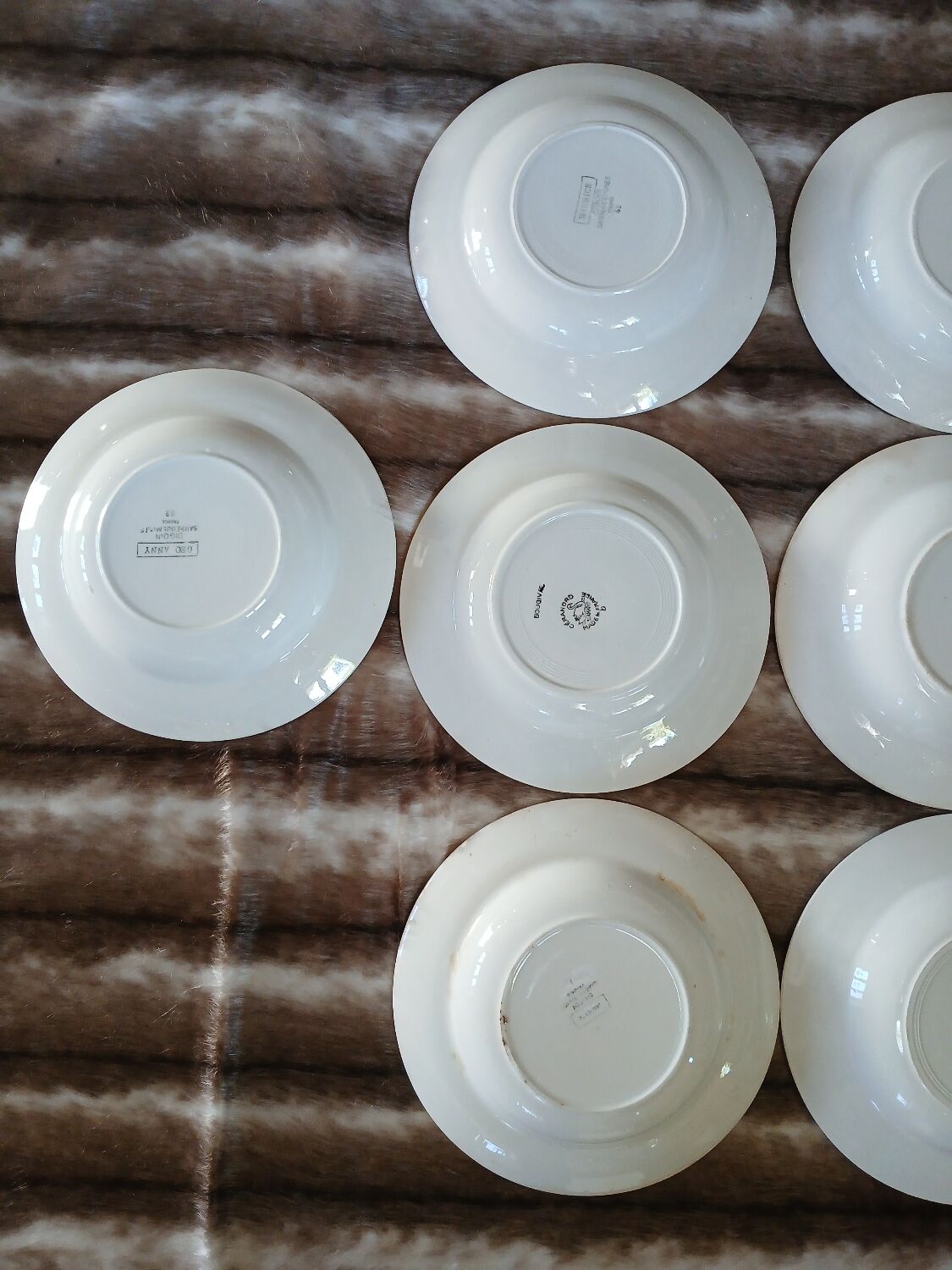 16 mismatched antique deep plates