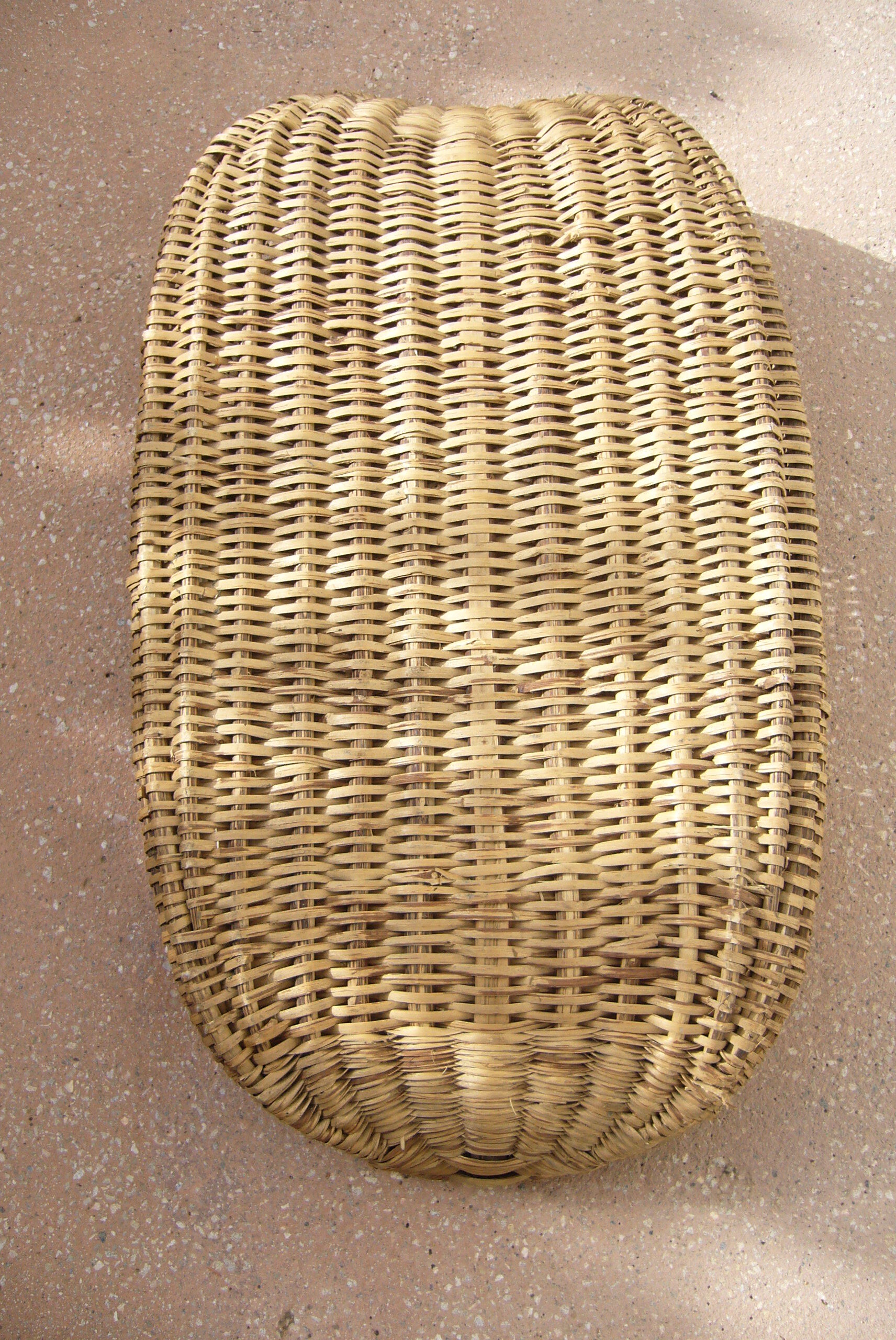 Old wicker laundry basket