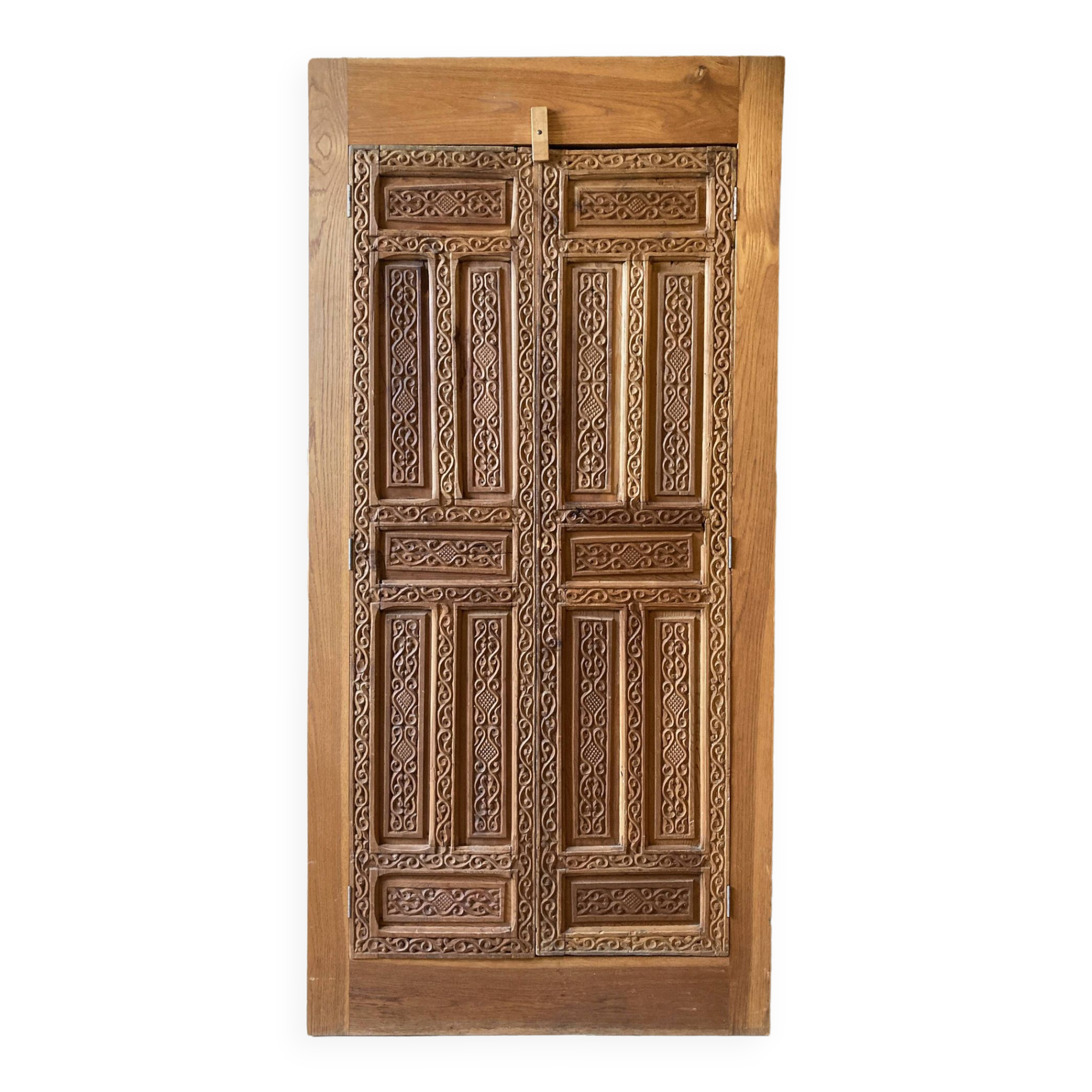 Wardrobe with exotic carved doors