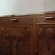 Low sideboard from the beginning of the twentieth century in walnut.