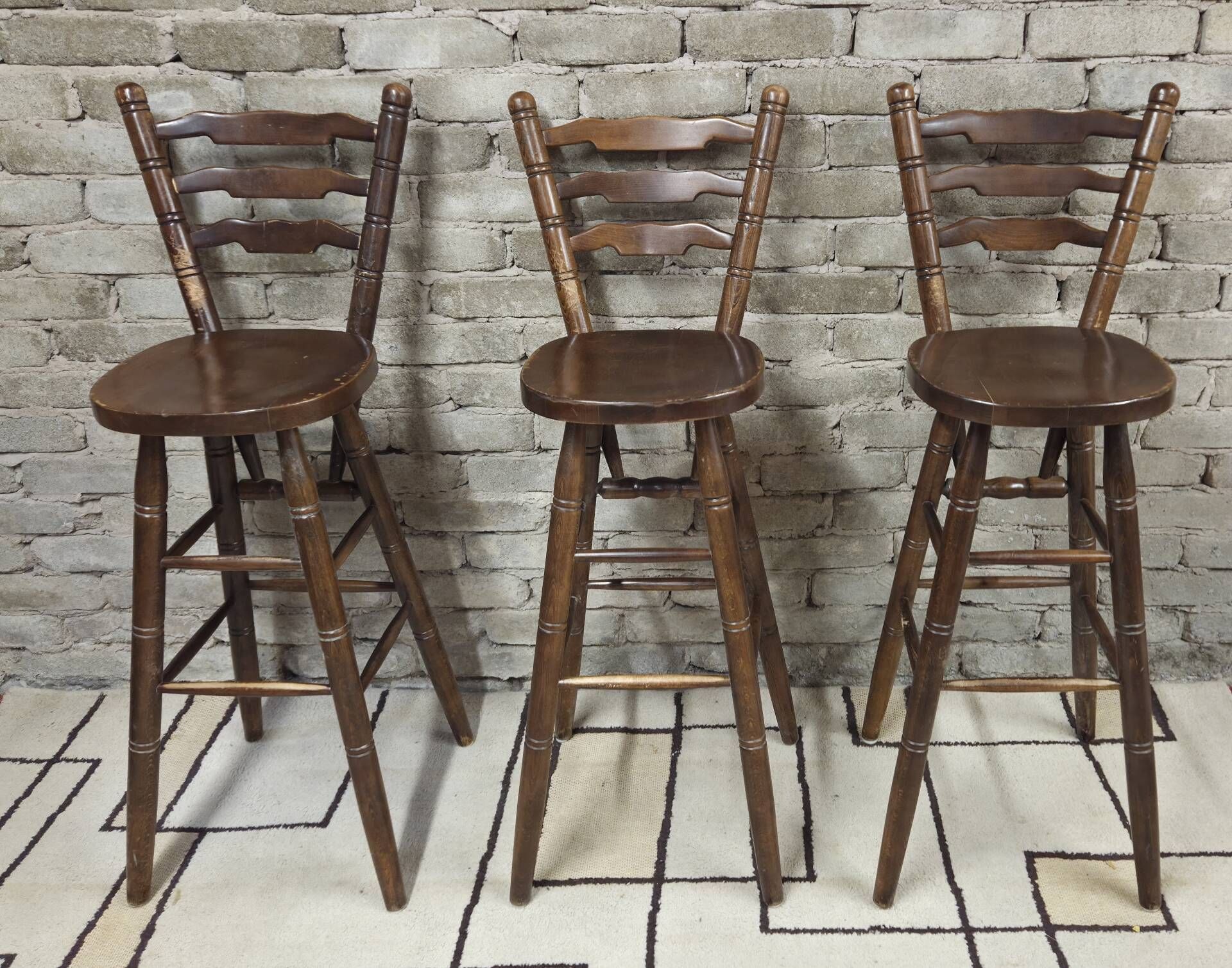3 vintage wooden bar stools from the 60s/70s with a bistro spirit.