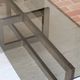 Smoked glass coffee table, brushed stainless steel base, 1970s.