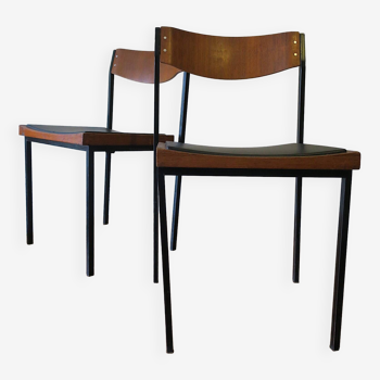Pair of teak and iron stacking chairs, 1960s