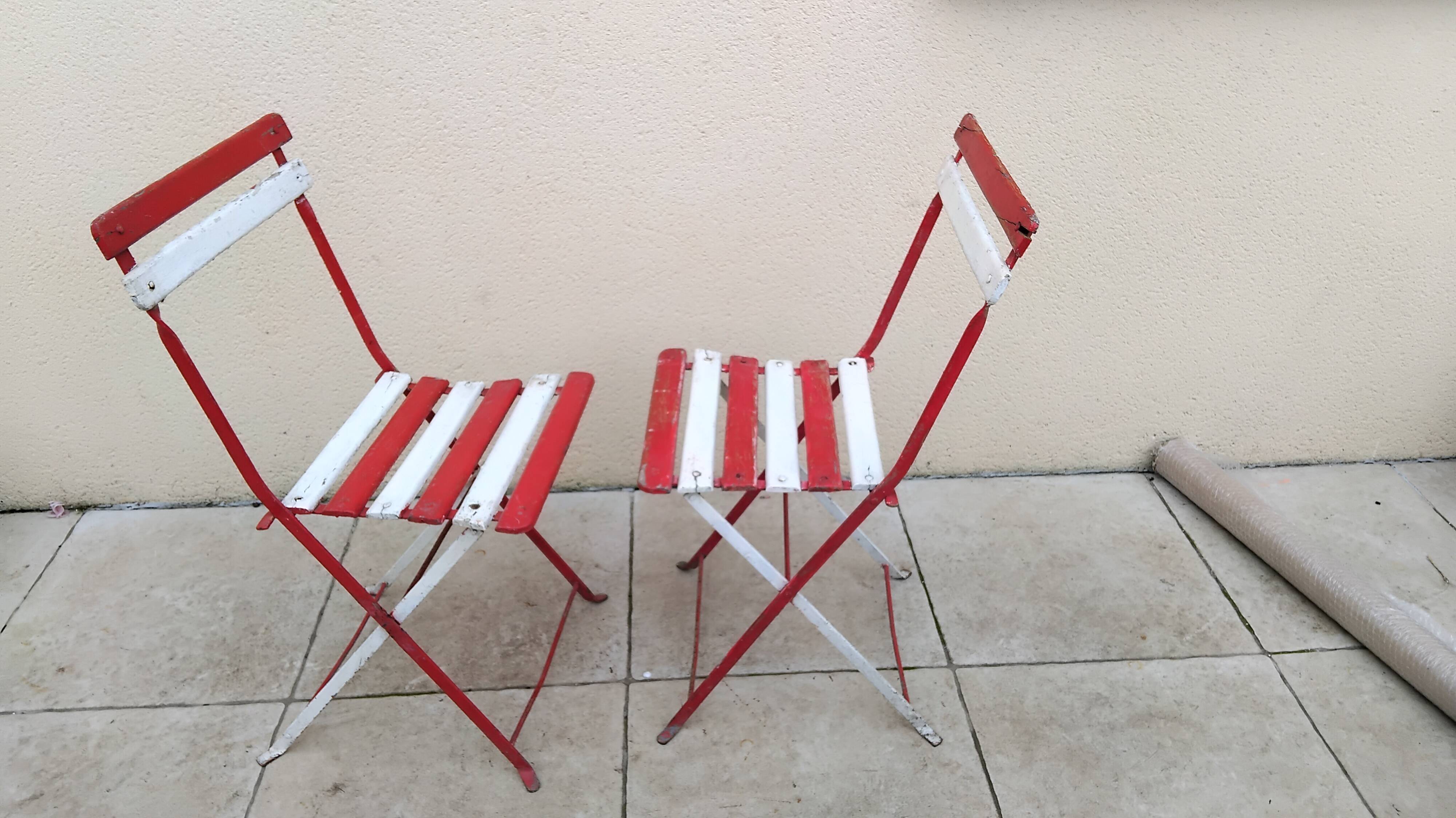 Pair of antique 1900s folding garden bistro chairs