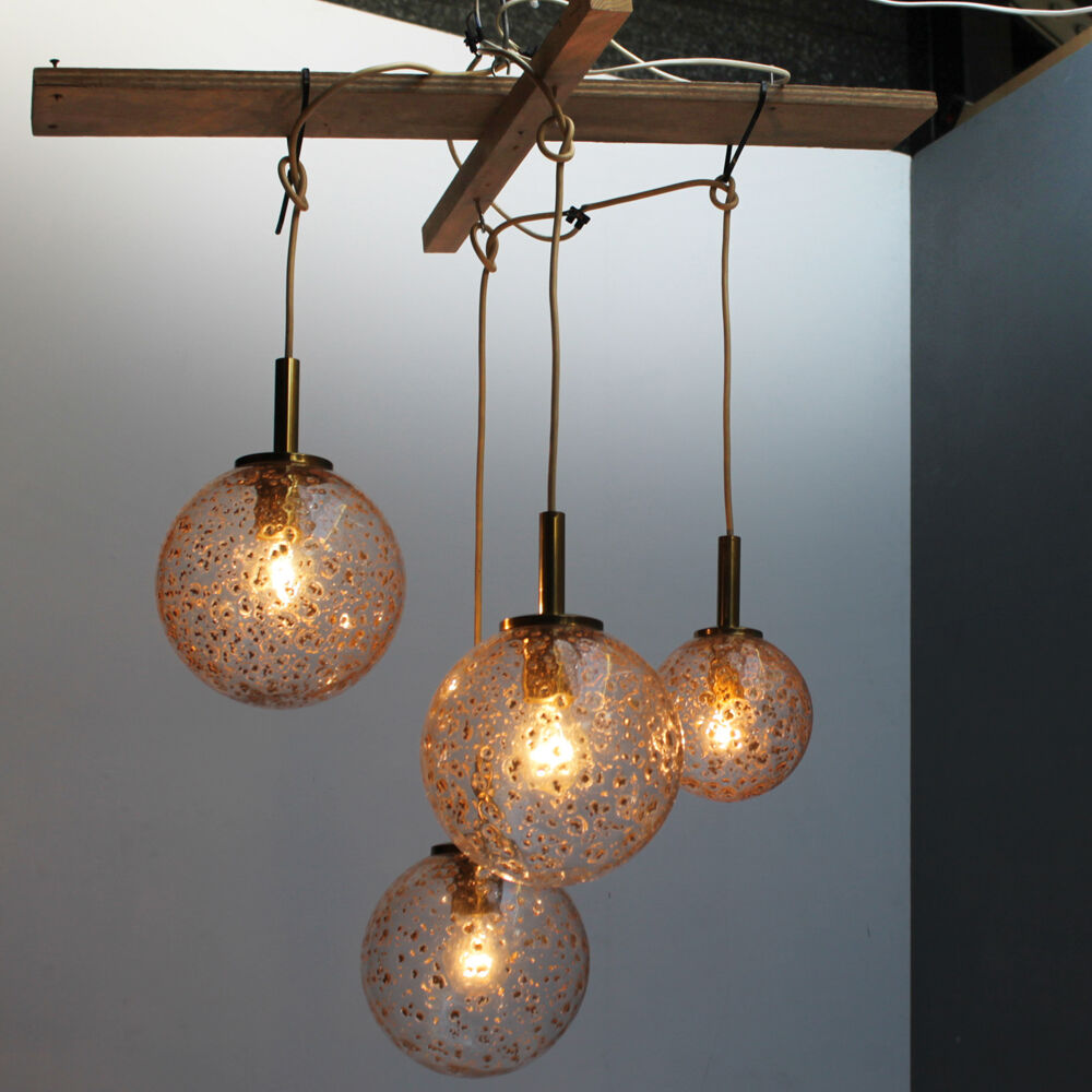 Four gold fleck globe pendants by Doria Germany