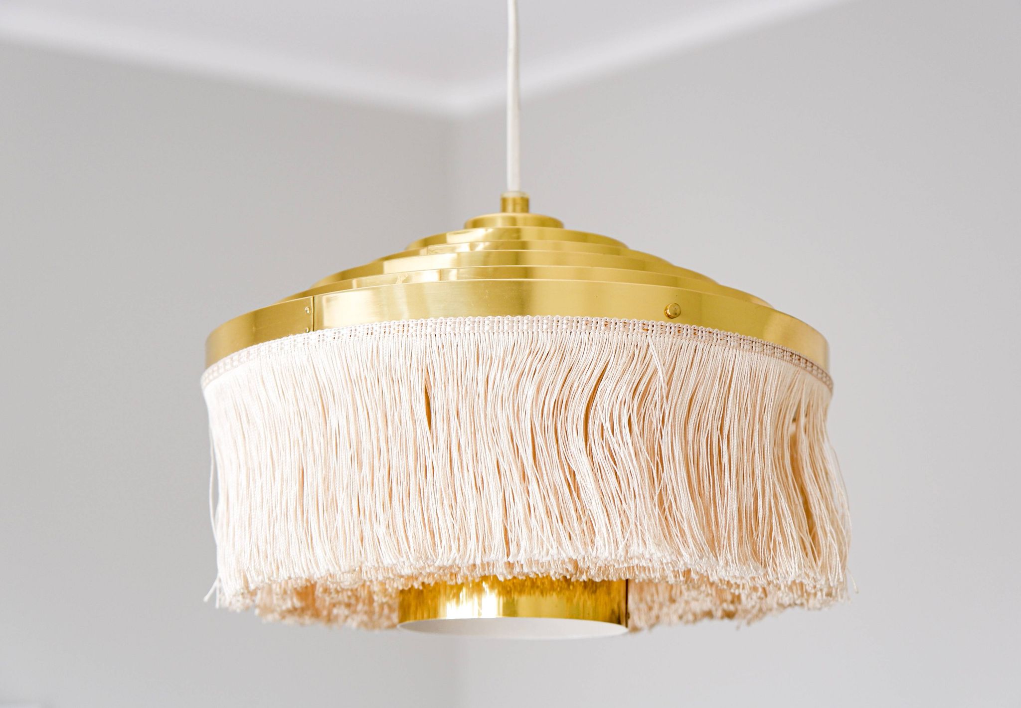 Hans Agne Jakobsson silk and brass fringe pendant circa 1960.