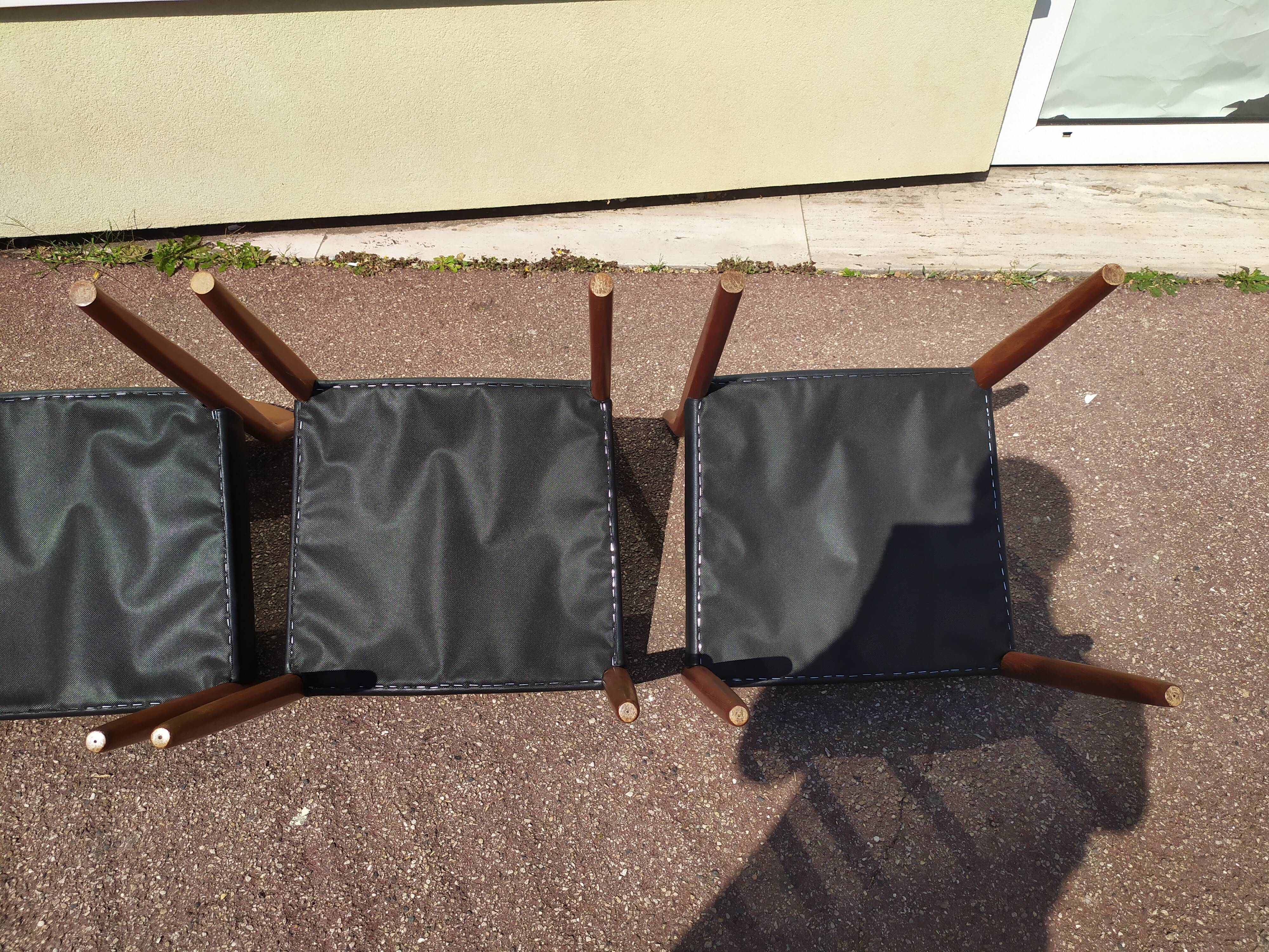 Set of 4 Scandinavian teak chairs in black leather