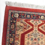 Old rectangular wool carpet, oriental decoration