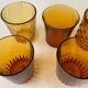 Ensemble de 10 verres dépareillés ambrés