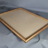 Old frame beaded decoration, gilded stucco wood