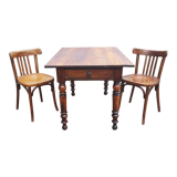 Antique farmhouse table and bistro chairs