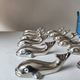 12 silver metal whale knife rests