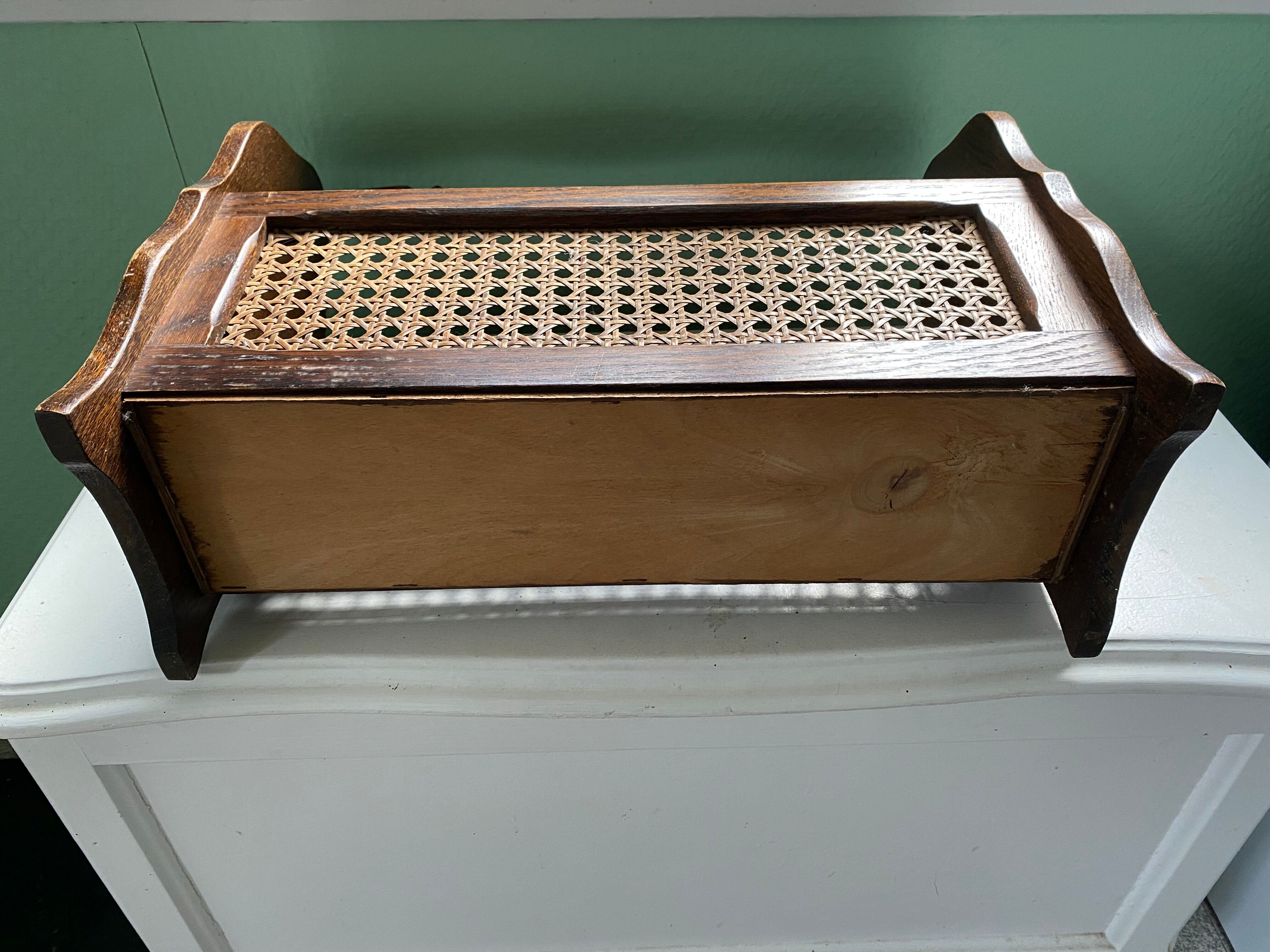 Wooden and cane newspaper rack